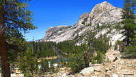 Granite giants rise up from both sides of the river