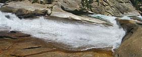 This next dramatic waterfall features an abrupt 90 degree turn mid-cascade where a granite ledge protrudes into the river