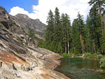 Several miles downriver, the flow is relaxed again. That's the trail traversing the slanted slope at left