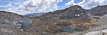 The dramatic high alpine view south (L) and west (R) from atop Forester Pass. You can make out the trail in the bottom center