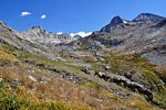 A horseman leads his mule train up towards Black Rock Pass