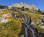 Cascades splash down the canyon walls from high lakes