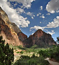 Zion National Park is a canyon land formed by the power of water, with sheer vertical walls and deep, twisted slot canyons.