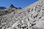 Climbing cross-country through scree and talus 1.6 mi. from Fifth Lk. to Jigsaw Pass